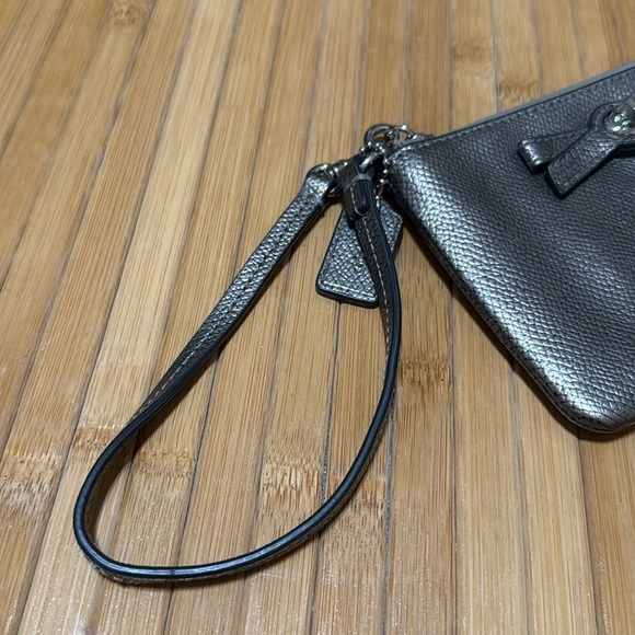 Coach Silver Turn Lock Wristlet with Bow Accent - Picture 2 of 4